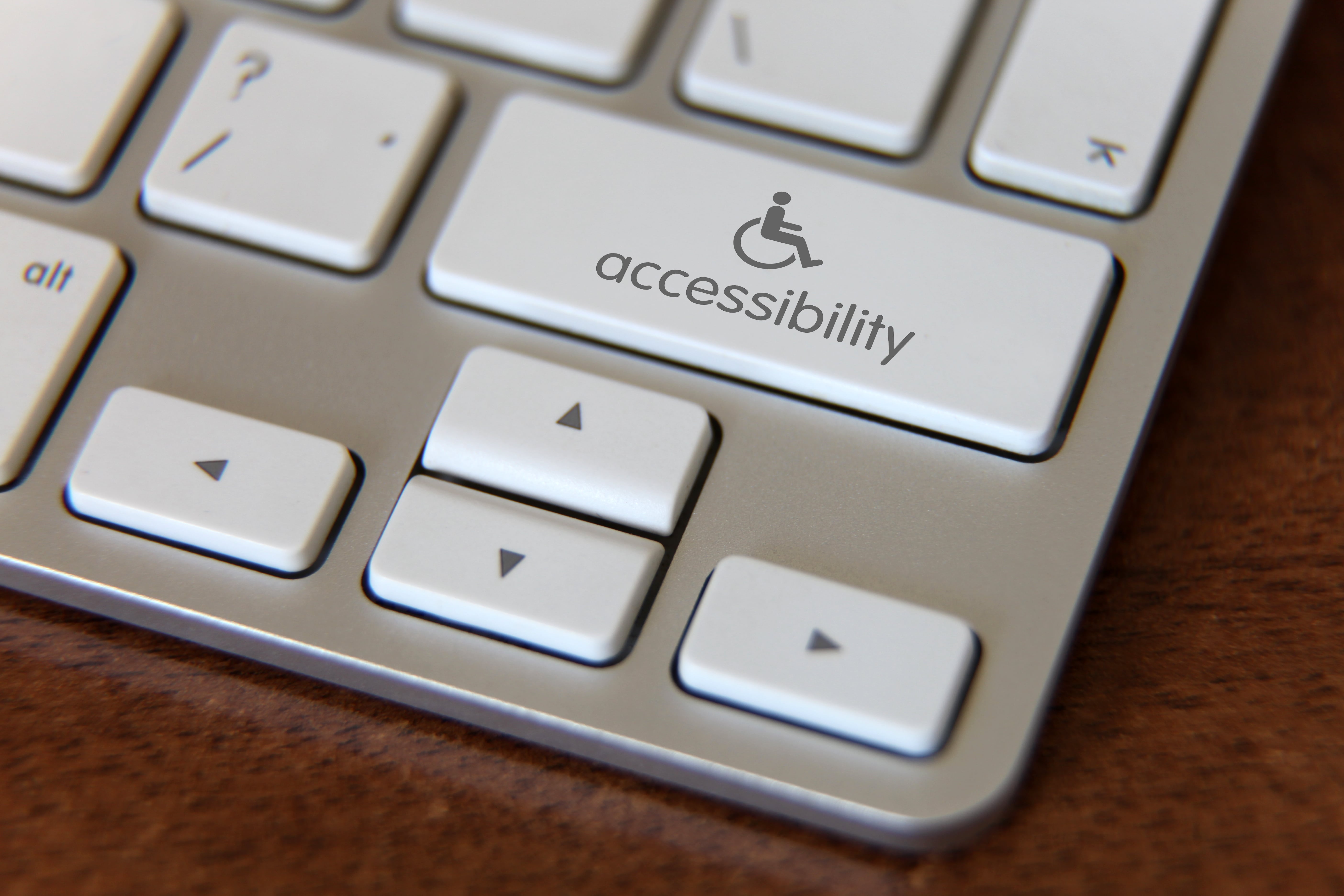 Website accessibility icon on computer keyboard